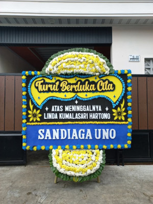 Papan Bunga Duka di Girian Weru Satu